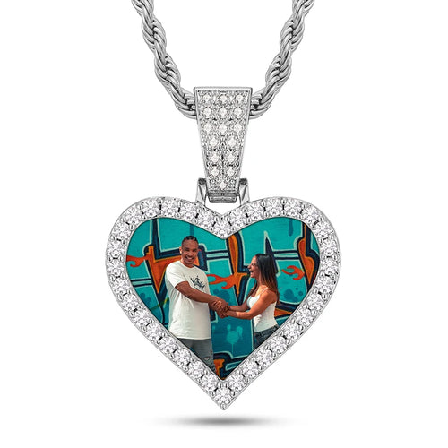 The Memory Pendant in silver, heart shape with moissanite halo and a custom photo