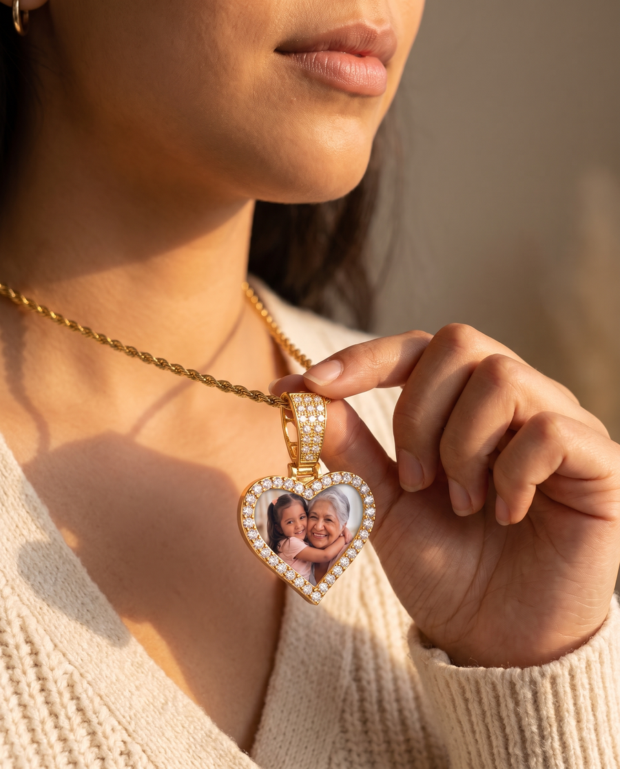 Gold tone photo pendant worn close to the heart