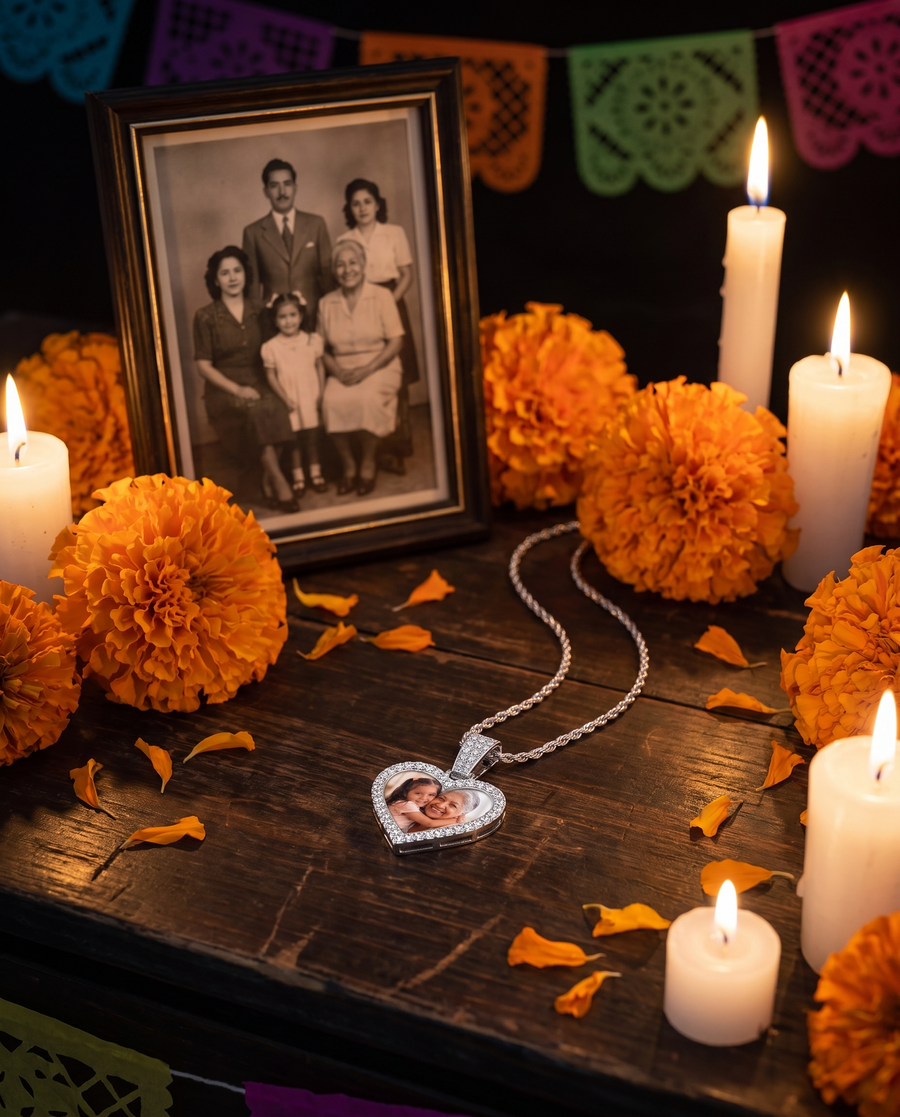 Silver photo pendant on a Dia de los Muertos ofrenda with marigolds